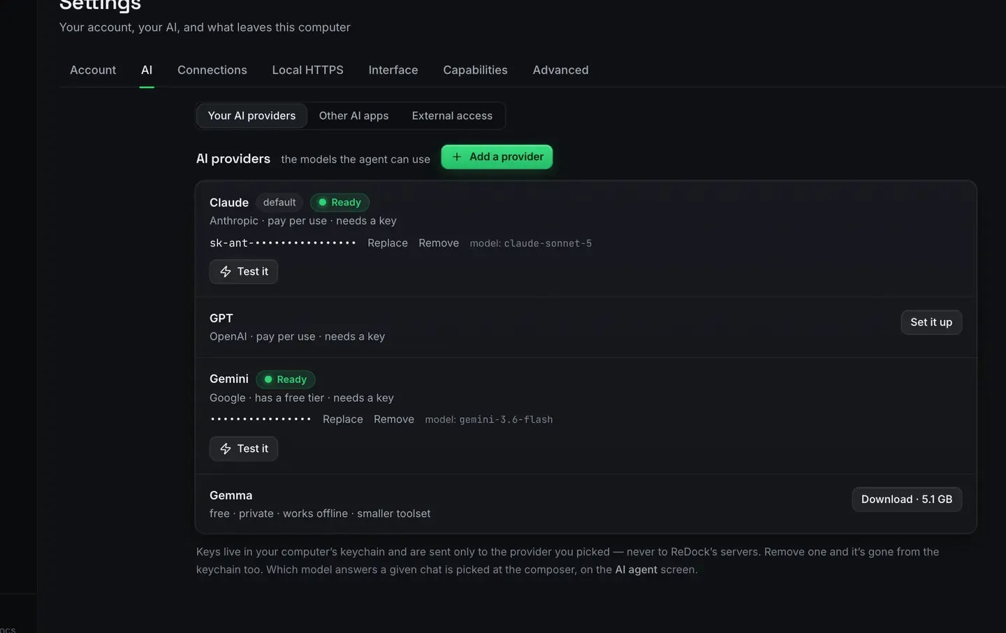 The AI providers panel in the ReDock desktop app’s settings, listing the models the agent can use: Claude marked default and ready, GPT waiting to be set up, Gemini ready on a free tier, and a local model offered as a download with its size. A note says keys live in your computer’s keychain and are sent only to the provider you picked, never to ReDock’s servers.